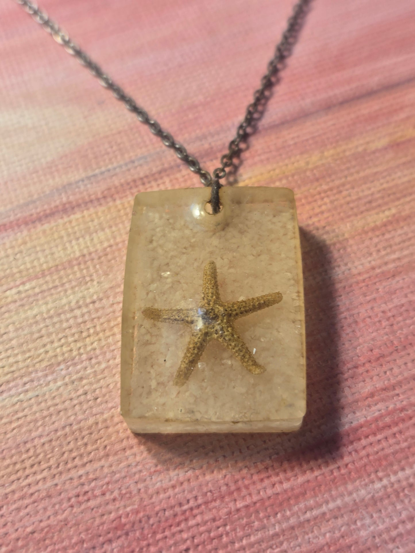 Starfish in White Sand Charm on silver necklace